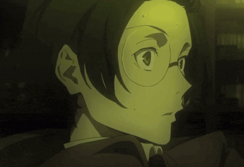 a close up of a person 's face with glasses and short hair