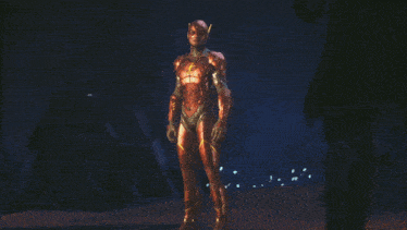 a statue of a man in a flash suit