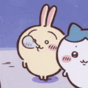 a rabbit and a cat are standing next to each other in the snow .