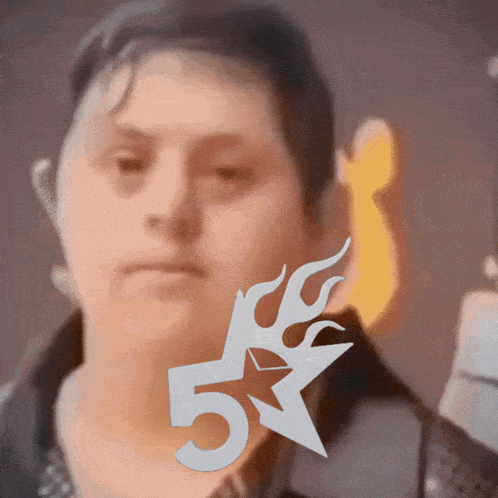 a blurred image of a woman with the number 5 and a star
