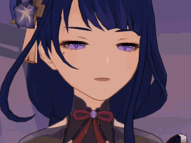 a close up of a girl 's face with the letter f visible