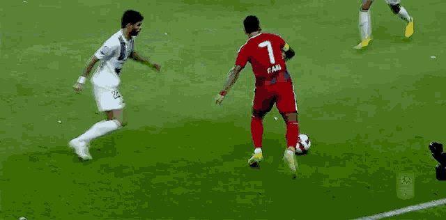 a soccer goal with a sign in the background that says ' des '