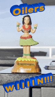 a hawaiian bobble head with the words oilers written above it