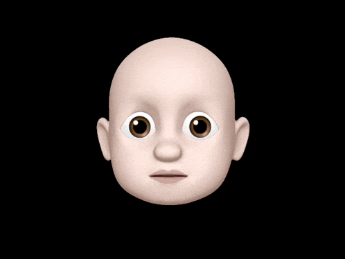 a baby 's face with its tongue sticking out on a black background