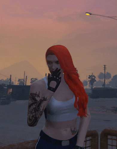 a woman with red hair is wearing a white tank top