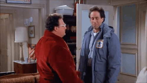 Seinfeld Newman GIF - Seinfeld Newman Coat GIFs