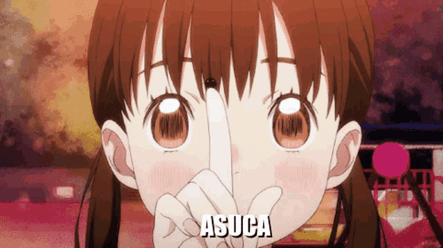 a girl is holding her finger to her nose and the word asuca is on the bottom right