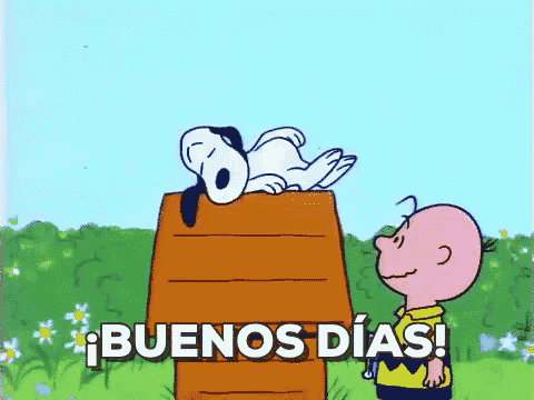 a cartoon of snoopy and charlie brown says buenos dias in spanish