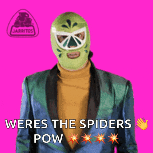 a man wearing a green mask and a blue jacket says weres the spiders pow