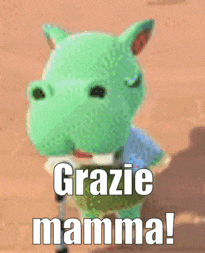 a green stuffed animal with the words grazie mamma written on it