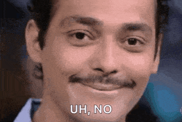 a man with a mustache is making a funny face and says `` uh , no '' .