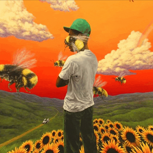 a man in a green hat is surrounded by bees