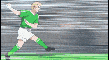 a soccer player in a green shirt and white shorts is kicking a ball