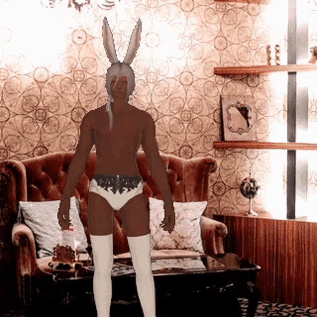 a man in bunny ears stands in a living room