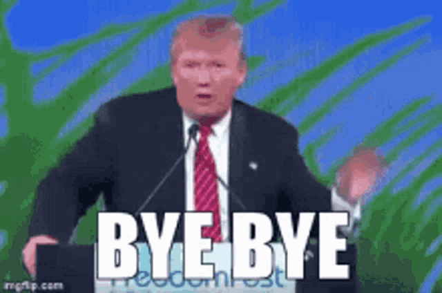 a man in a suit and tie is giving a speech and says bye bye .