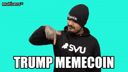 a man with a beard wearing a black hoodie and a beanie says trump memecoin