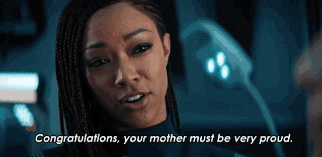 a woman says congratulations to her mother who must be very proud