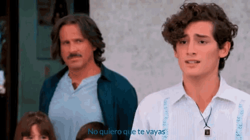 a man and a boy are standing next to each other with the words " no quiero que te vayas " written on the bottom