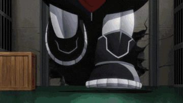 a robot 's feet are coming out of a hole in the wall