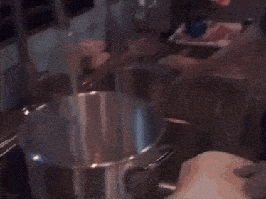 a person holding a bottle that says ice tea on it