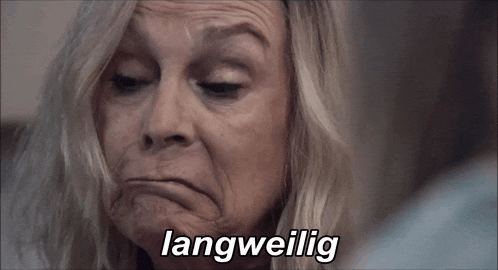 a close up of a woman 's face with langweilig written in white