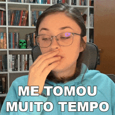 a woman wearing glasses covering her mouth with her hand and the words me tomou muito tempo