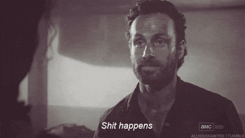 a black and white photo of a man with the words shit happens on the bottom