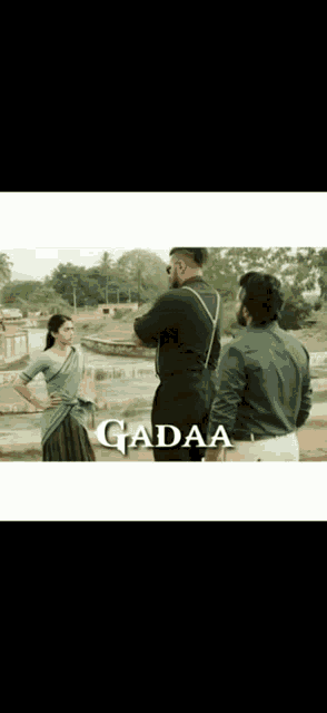 a man and a woman are standing next to each other in a scene from a movie called jadaa .