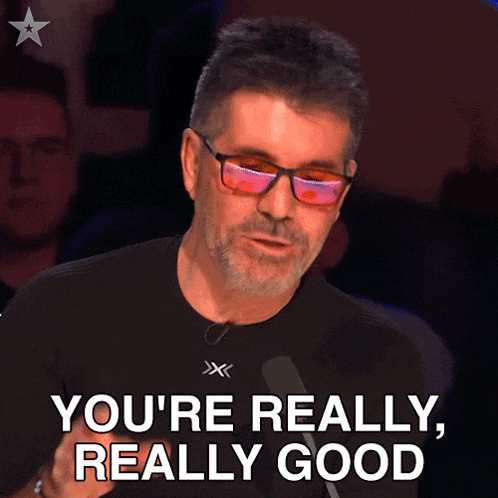 a man wearing sunglasses and a black shirt says you 're really really good