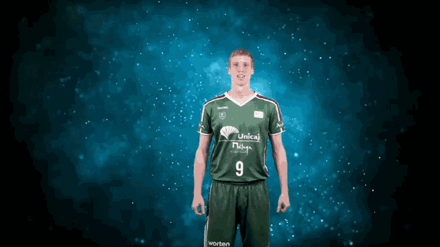 a basketball player wearing a green uniform with the number 9 on it