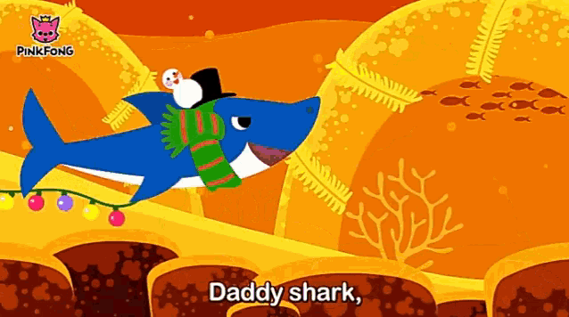 a shark with a snowman on its back and the words daddy shark