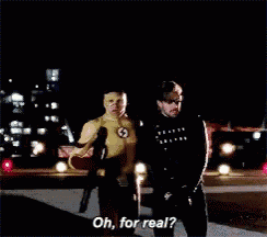 two men in superhero costumes are standing next to each other with one saying " oh for real "