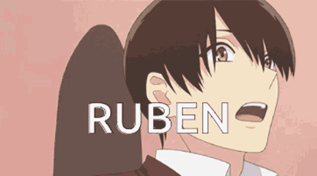 a close up of a person 's face with the name ruben on the bottom