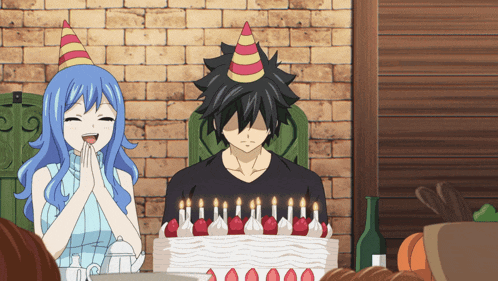a man and a woman are celebrating a birthday