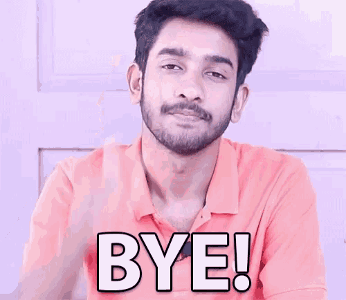 a man with a beard is waving his hand and saying bye !