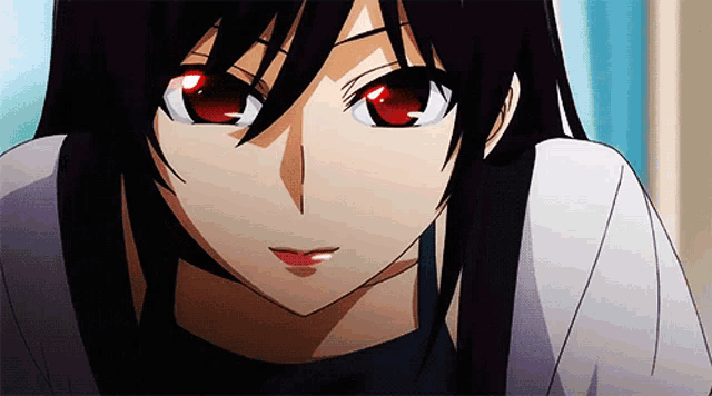 a close up of a girl with red eyes and black hair