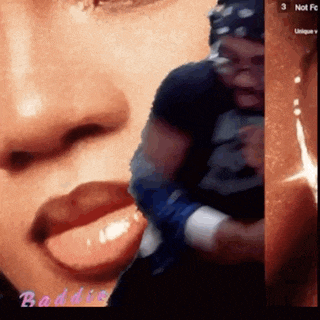 a close up of a woman 's face with the word baddie on the bottom left