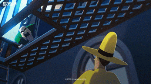a man in a yellow hat is standing next to a man in a green shirt on a staircase