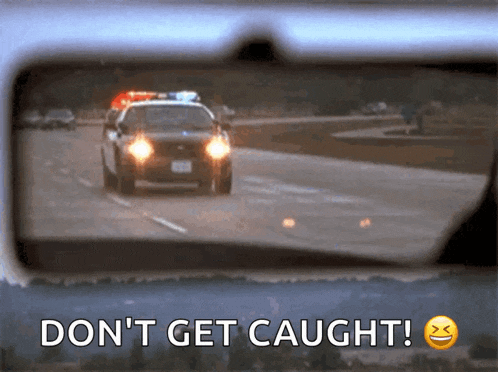 a police car is driving down a highway with the words " don t get caught " below it