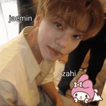 a young man with the name jaemin written on his forehead