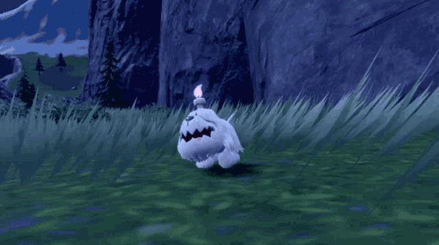 a white dog with a candle in its mouth is running in a field
