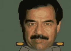 a man with a beard and mustache is wearing a military uniform and making a funny face .