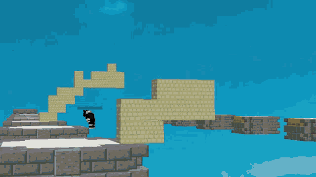 a screenshot of a video game shows a person jumping over a brick wall with a blue sky in the background