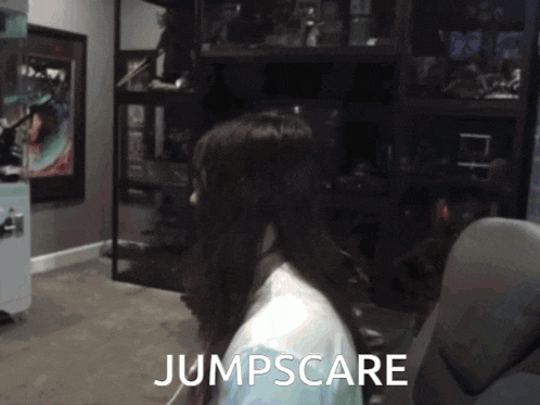 a woman sitting in a chair with the words jumpscare written on the bottom