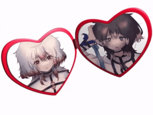 two heart shaped mirrors with a picture of a girl on one