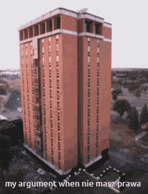 an aerial view of a tall brick building with the words my argument when nie masz prawa below it