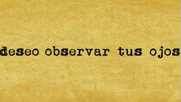 a typewriter says deseo besar tus labios on the paper