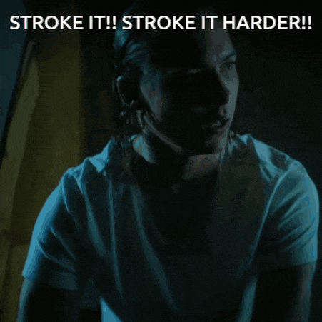 a man in a white shirt with the words stroke it stroke it harder