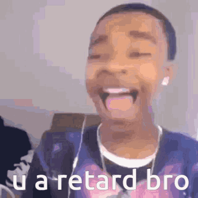 a young boy is making a funny face with his tongue out and the words u a retard bro above him .