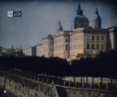 a blurred image of a building with the letters 24 ack on the bottom